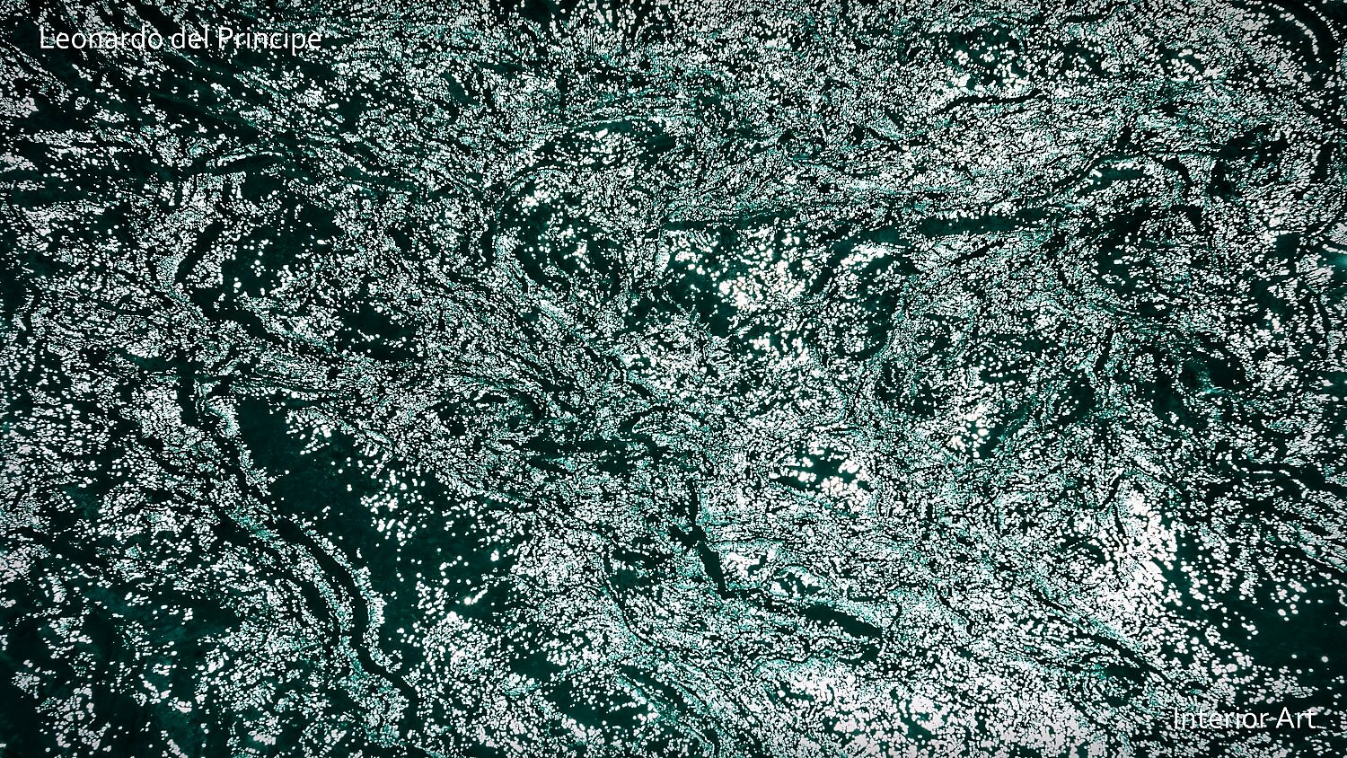 GLRI05 Abstract aerial view of mountain river waves forming intricate white patterns against deep green water. The sunlight creates a shimmering, textured effect