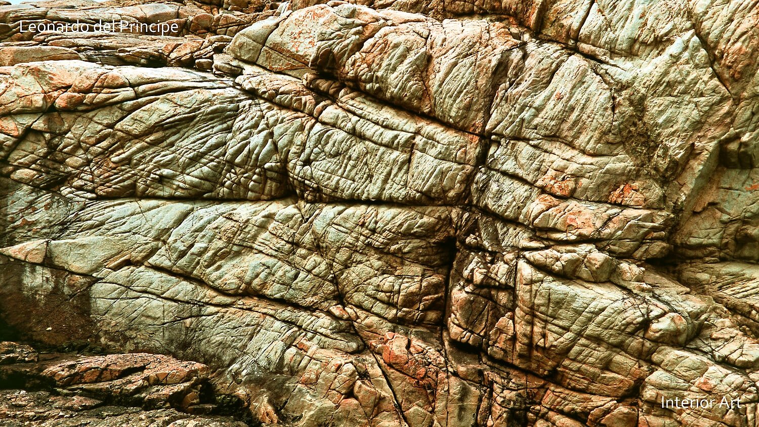 ESGR01 Close-up of textured rocky surface with intricate layers and earthy tones of brown and gray. The rugged pattern creates a natural, artistic appearance.