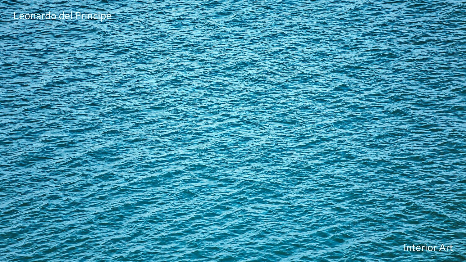 ESEAa02 A serene expanse of rippling turquoise sea water under soft lighting, creating a calming and tranquil atmosphere. The texture suggests a gentle breeze.